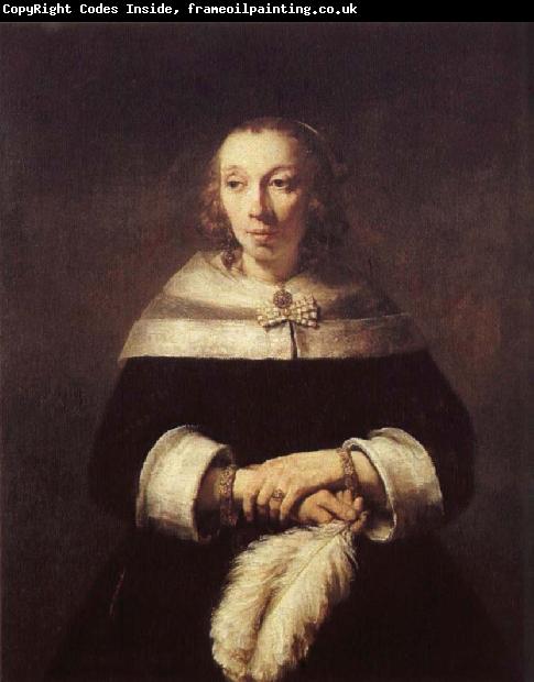 Rembrandt Harmensz Van Rijn A woman with solfjader of a strutsplym